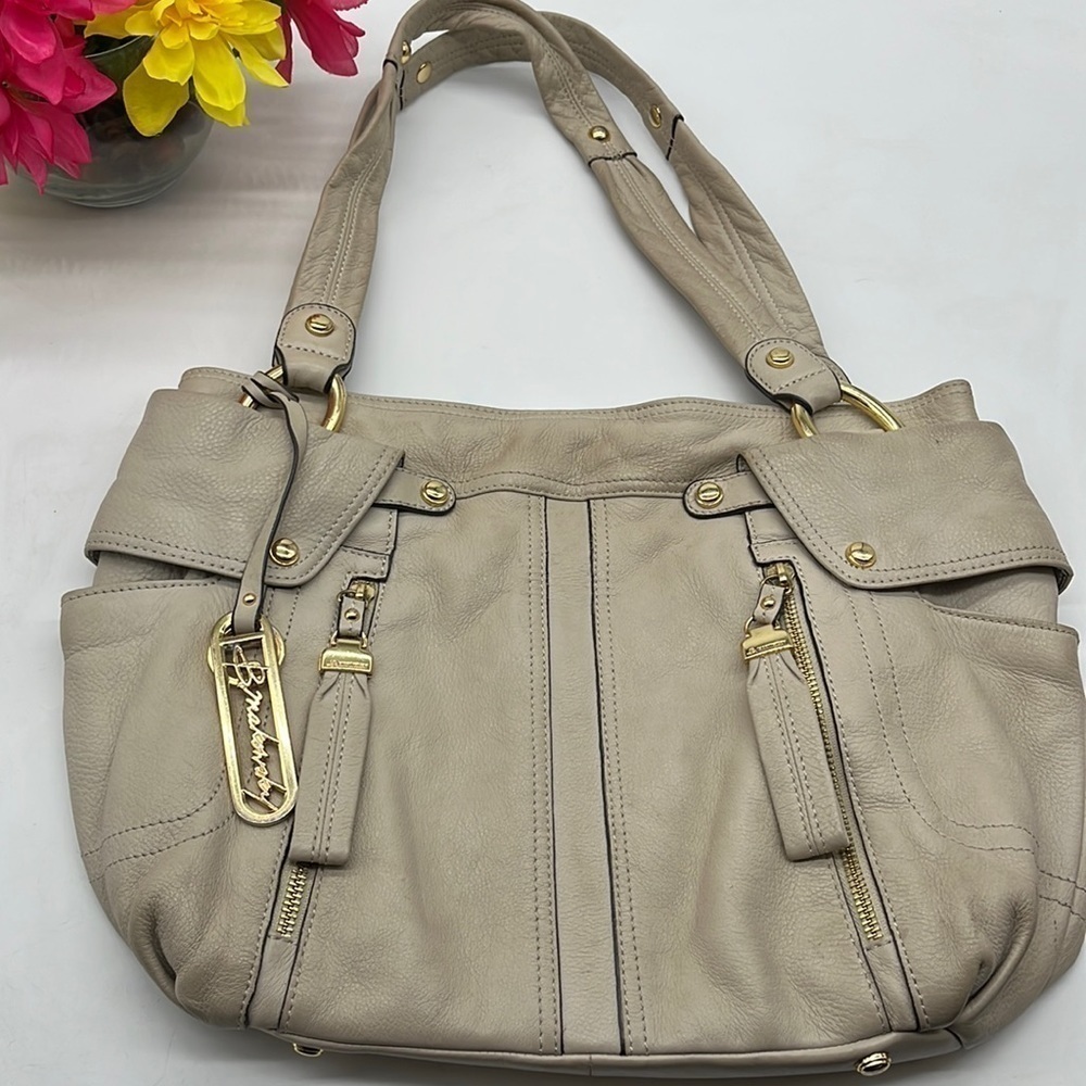 B. Makowsky Taupe Colored Leather Satchel with gold accents. MCB2256A